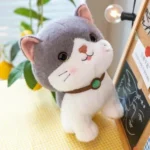 Cat Soft Toy – Cute and cuddly cat soft toy made with premium plush fabric, featuring a soft texture, adorable design, and fluffy filling, perfect for kids, gifting, cuddling, and room decoration.
