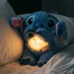 Blue Breathing Stitch Plush Toy with soothing breathing motion, soft lights, and calming music, designed as a comforting sleep companion for kids and adults.